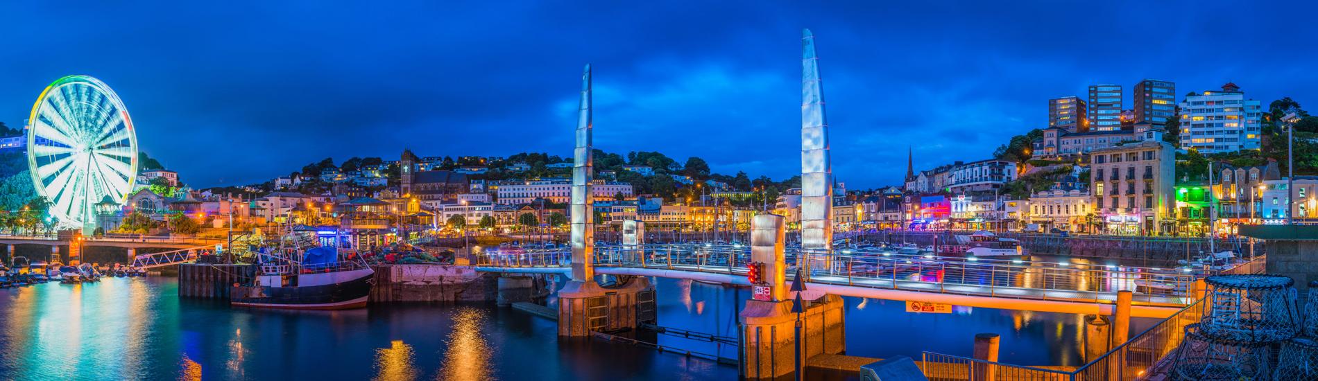 Torquay harbour at night with lights
