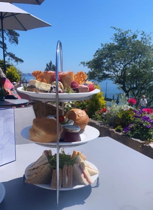 Afternoon tea set out in the terrace on a sunny day at the Osborne Hotel