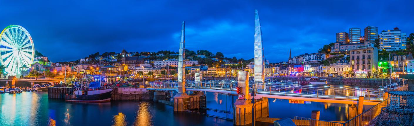 Torquay harbour at night with lights