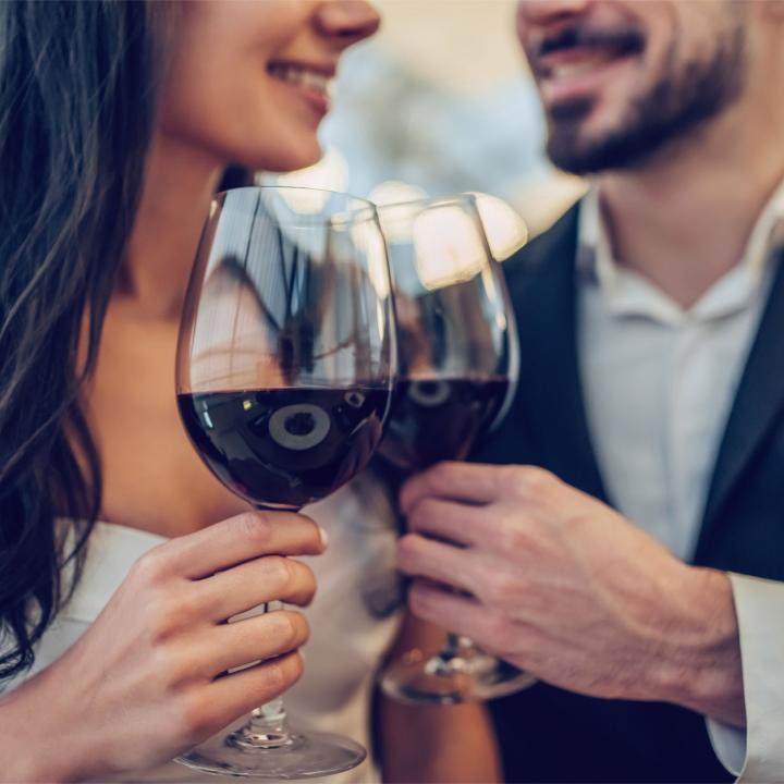 Man and woman drinking wine